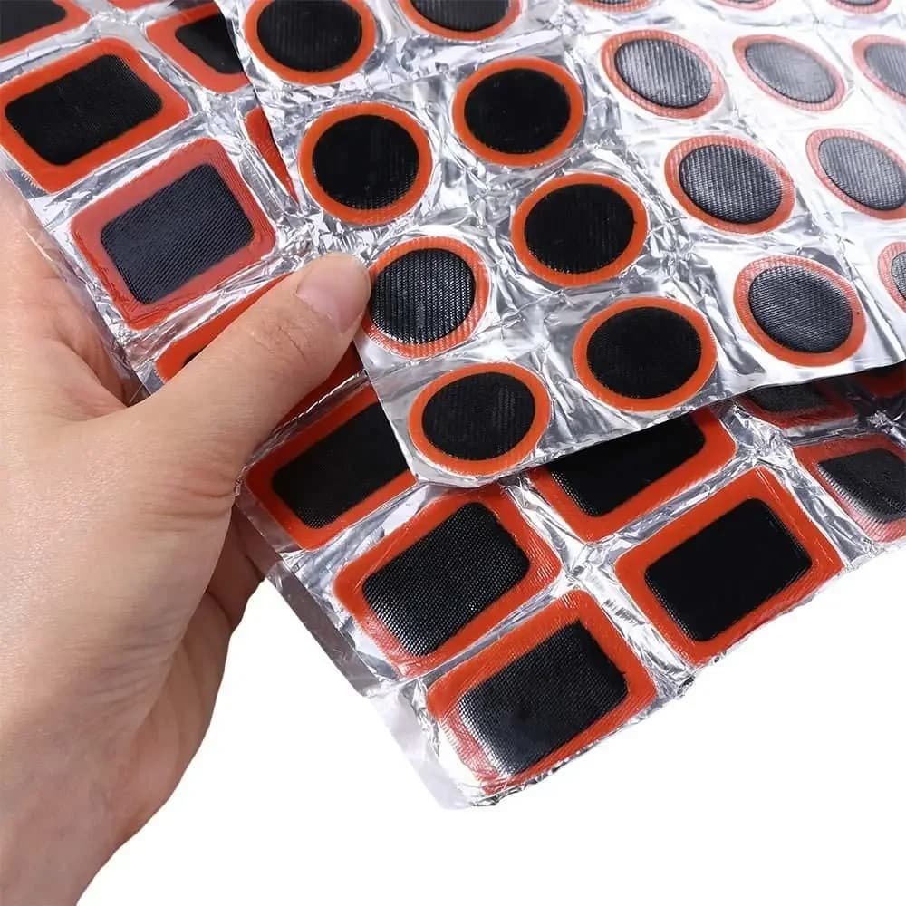 Kit di Riparazione Pneumatici Bici 48 Pezzi, Patch in Gomma Senza Colla per Riparare Forature di Camere d'Aria