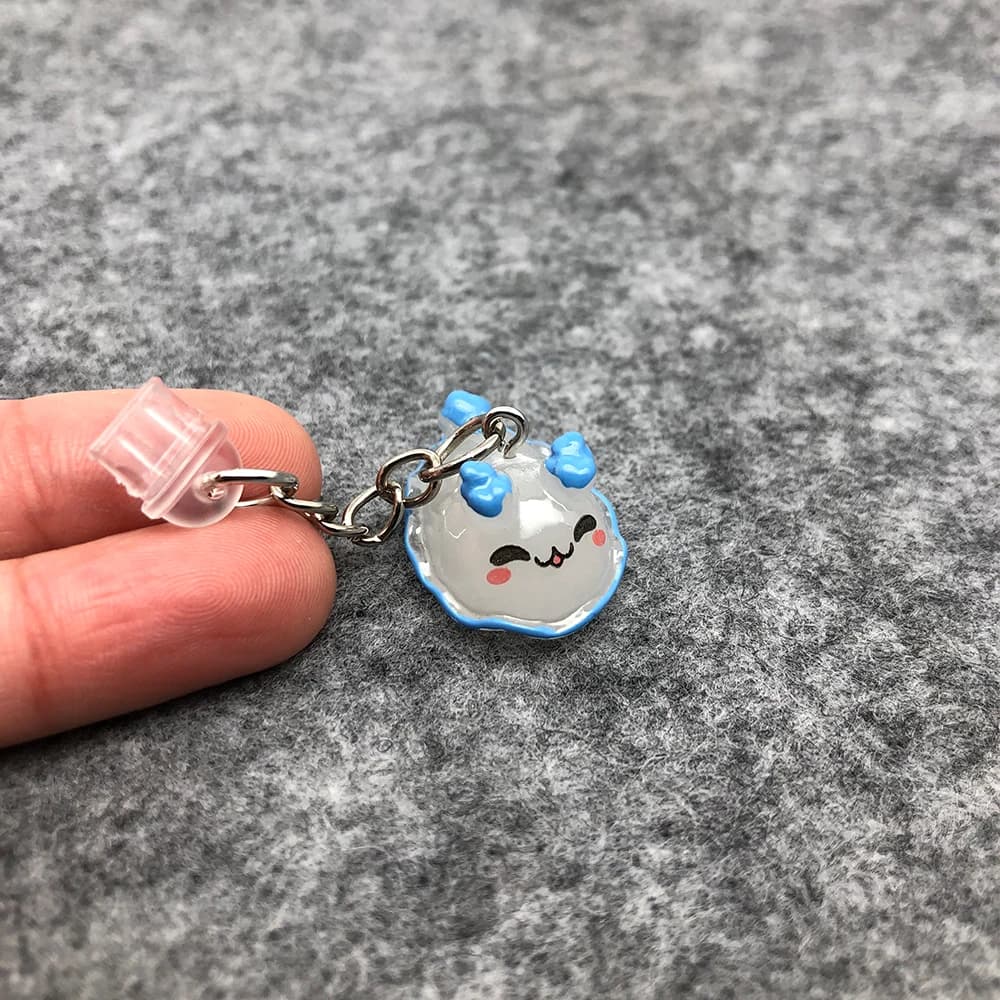 Adorabili e pratici tappi antipolvere con ciondoli in resina Sea Slug per telefoni cellulari, tablet, laptop, USB-C e porta schiarente
