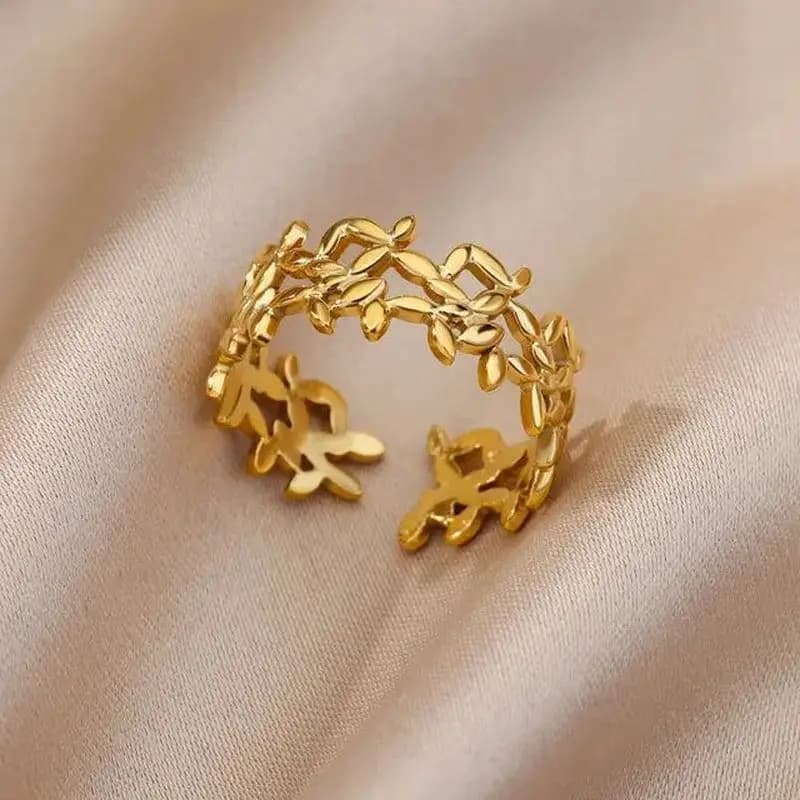 CarlidanaFashion style gold hollow olive branch open ring, niche design with a light luxury feel, versatile ring