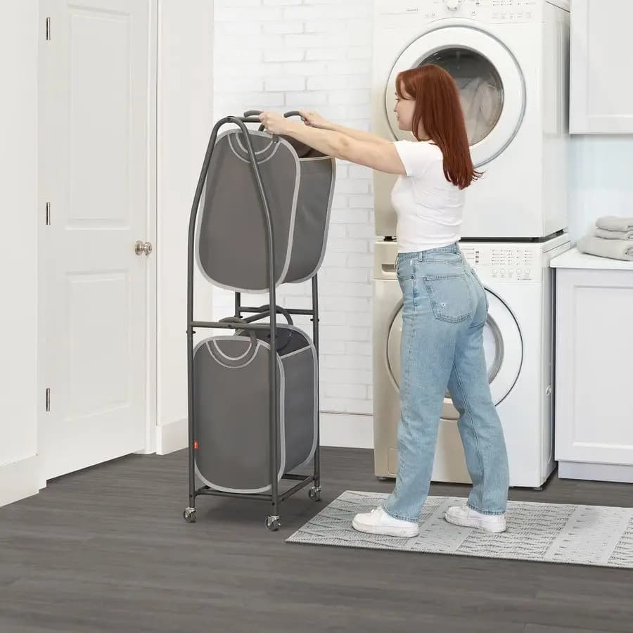 2-level whiteboard with wheels and 2 white bags for dirty clothes, towels, blankets, bathroom