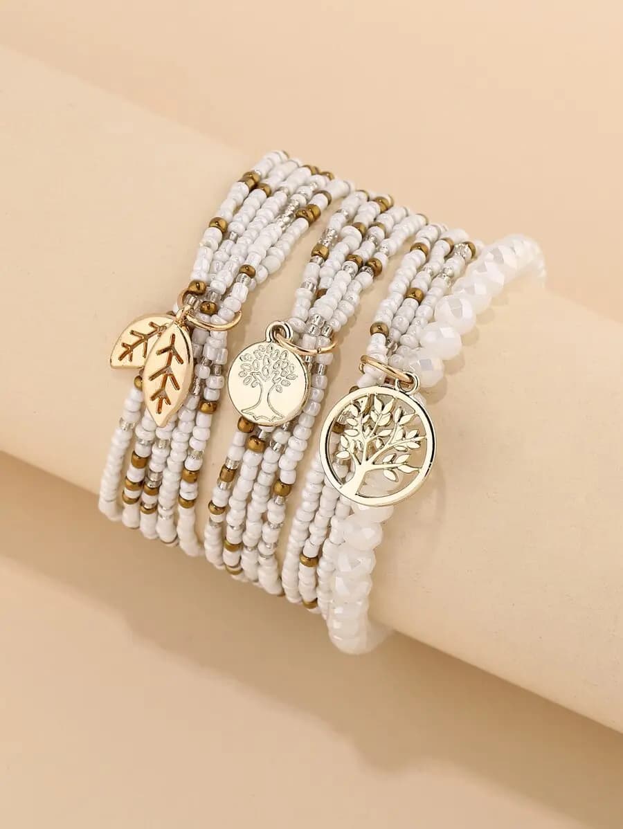 Set di 3 braccialetti avvolgenti con perline bianche e ciondoli a forma di albero e foglia