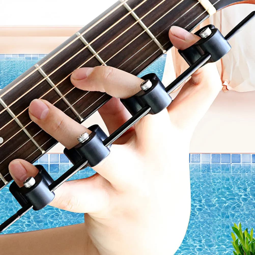 Espansore per dita per chitarra, pianoforte e ukulele, in ABS e rame, strumento portatile per allenare le dita e migliorare la destrezza