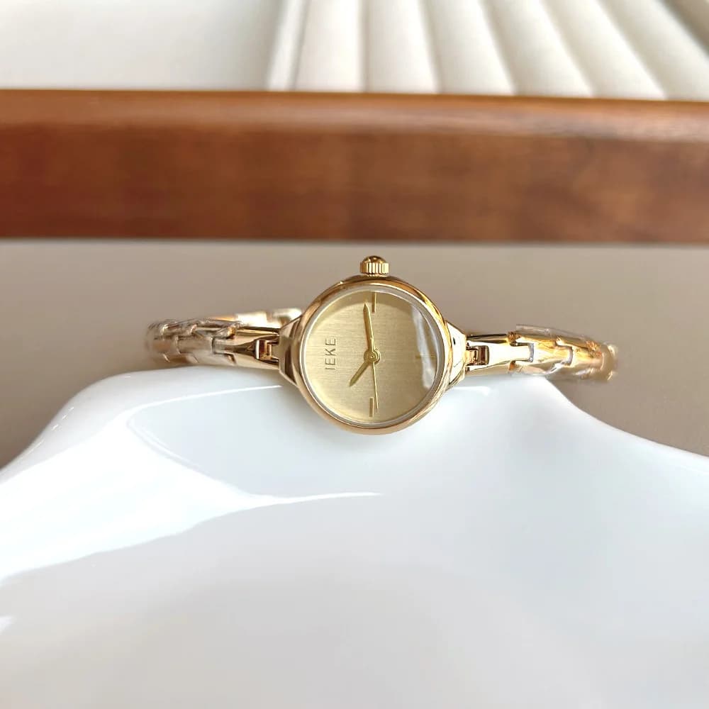 Orologio da donna con bracciale rotondo colorato, design sofisticato, accessori da donna al quarzo eleganti e semplici e versatili.