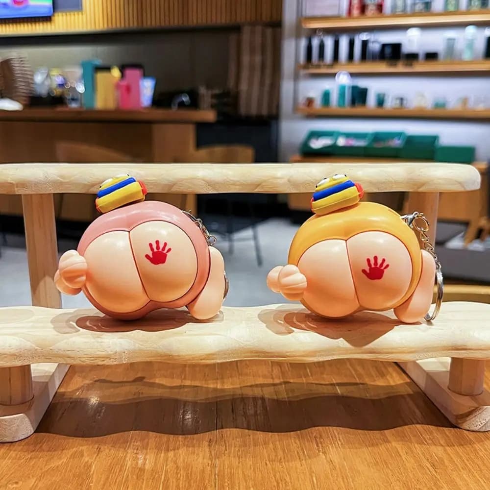 Divertente produzione sonora Sculacciata Portachiavi Emit Light Cartoon Glutei vocali Giocattolo Divertente PVC Fidget Portachiavi Giocattoli Zaino Decor