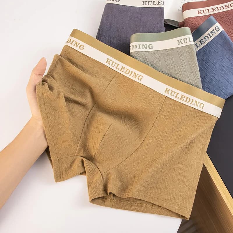 Biancheria intima da uomo in cotone morbido Mutandine traspiranti a vita media Maschile sexy U Custodia rigonfia Boxer Ropa Interior Hombre Calzoncillos
