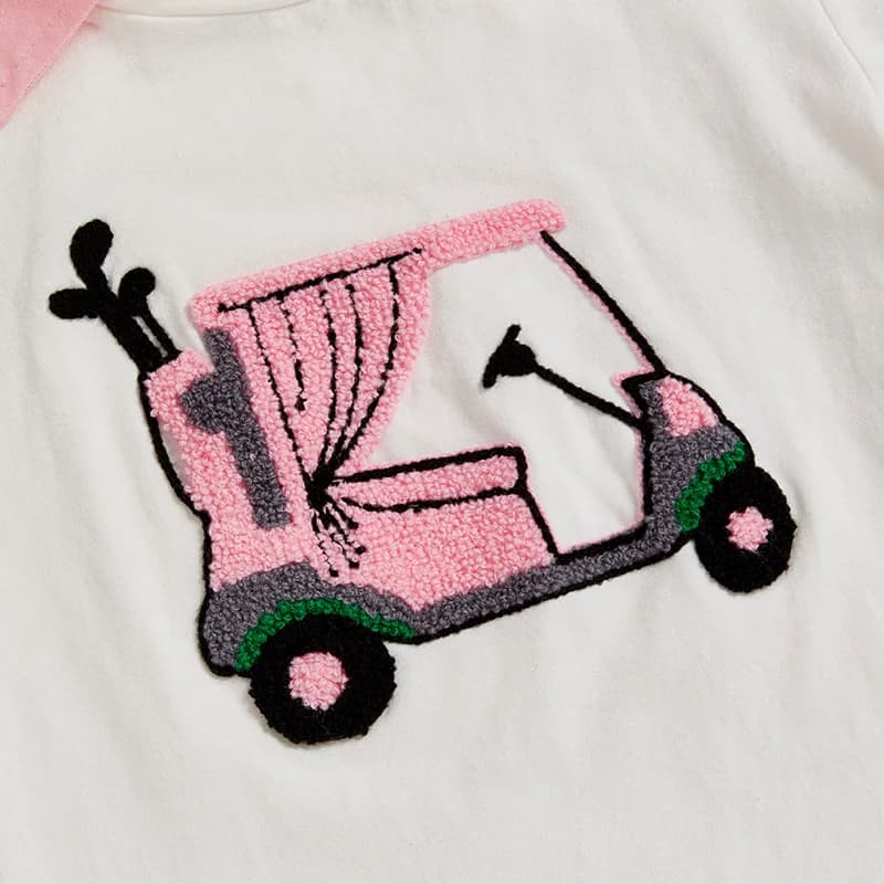 Adorabile completo estivo per bambina con grazioso set coordinato con maglietta a maniche corte e gonna dal design da golf per un look elegante
