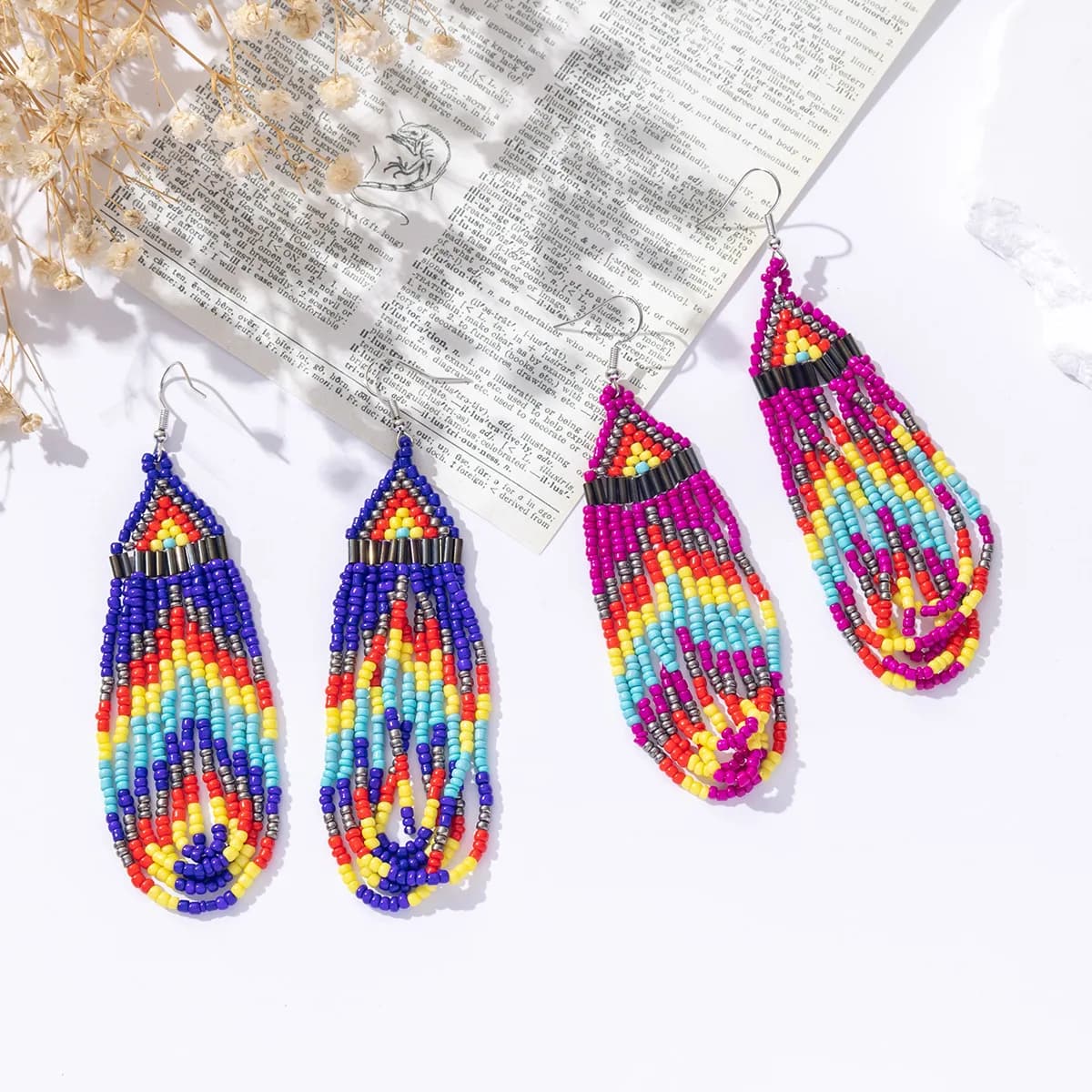 Orecchini di perline bohémien con nappe Freccia arcobaleno Colori sfumati Gioielli con perline di riso in lega di tendenza femminile intrecciati a mano
