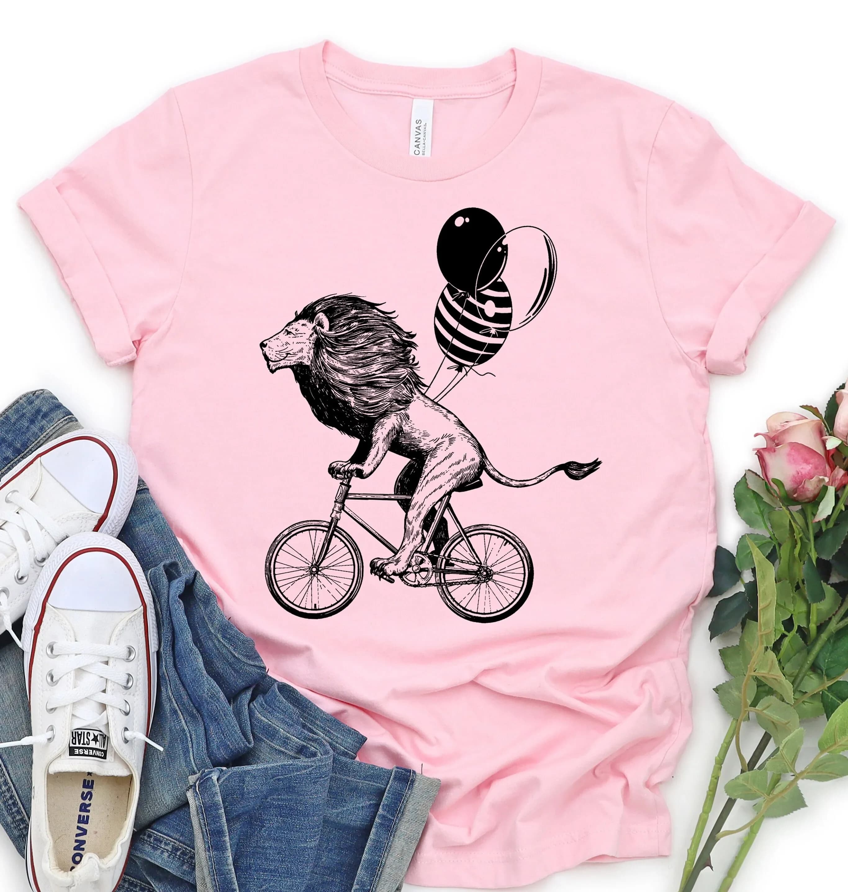 Maglietta da donna con leone ciclista su bicicletta, per amanti degli animali, simpatico animale, per la sua scuola/spirituale.