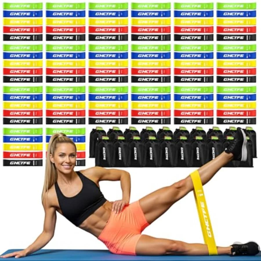 Set di bande elastiche per fitness: mini bande in lattice nere, blu, rosse, verdi, viola, resistenti, codificate a colori per un allenamento progressivo.