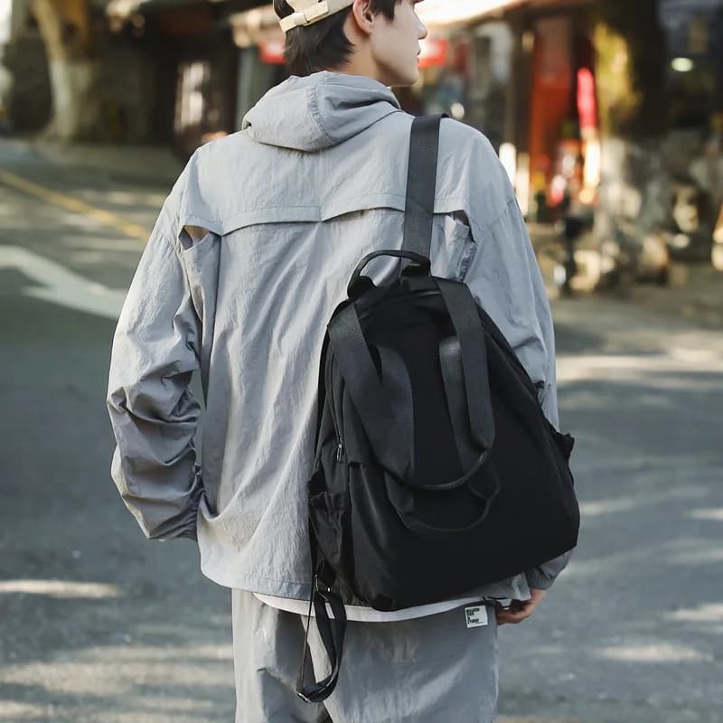 New school season waterproof backpack with high-end feel lightweight and large capacity simple hand-held student backpack
