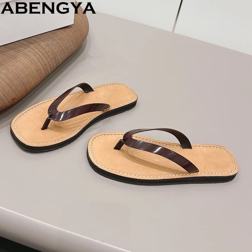 Ciabatte estive piatte da donna, nere in pelle, casual, in EVA, per le vacanze, modello mules.
