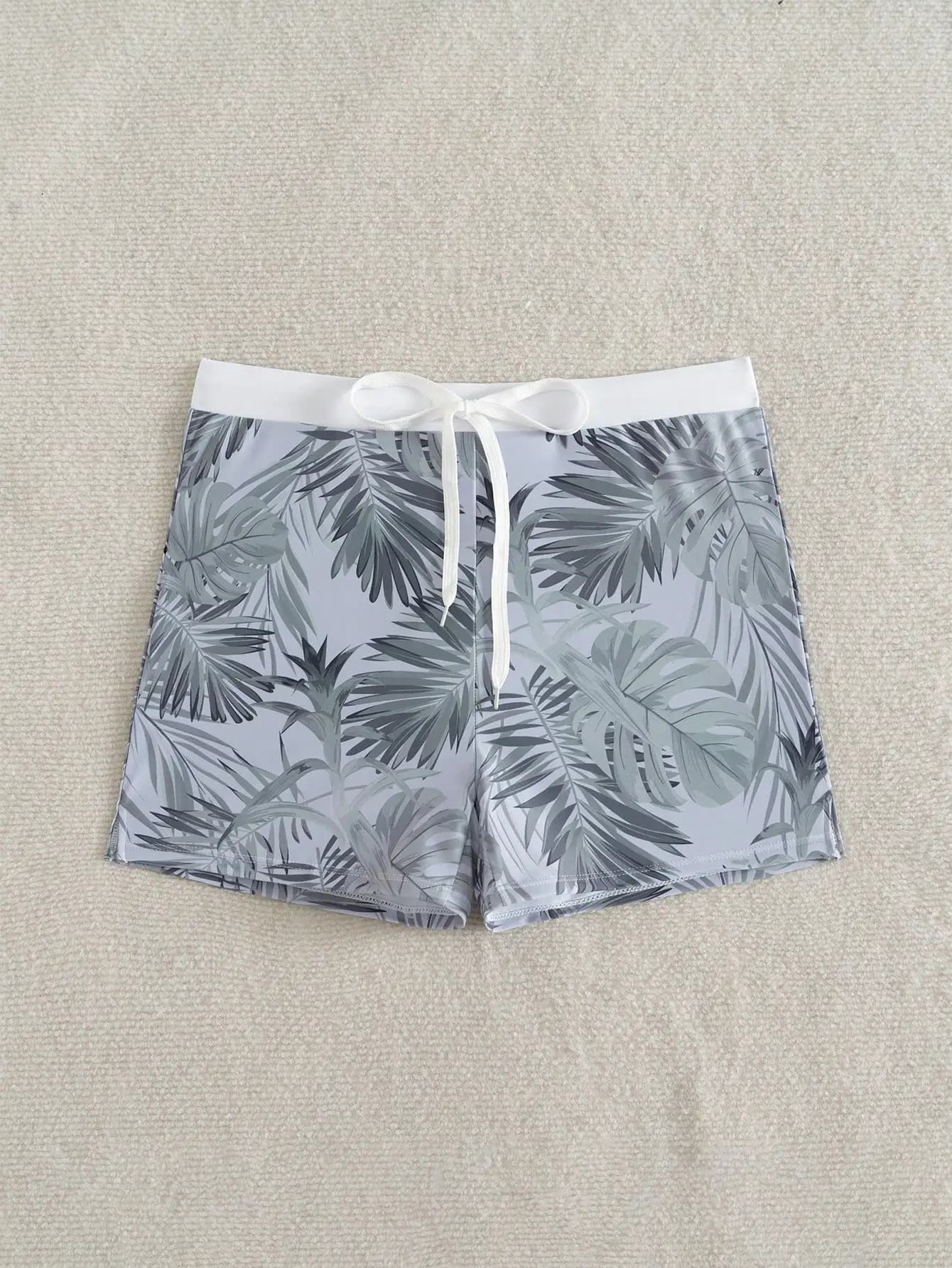 Pantaloncini da bagno da uomo con stampa di foglie tropicali, con coulisse regolabile in vita e tessuto elasticizzato