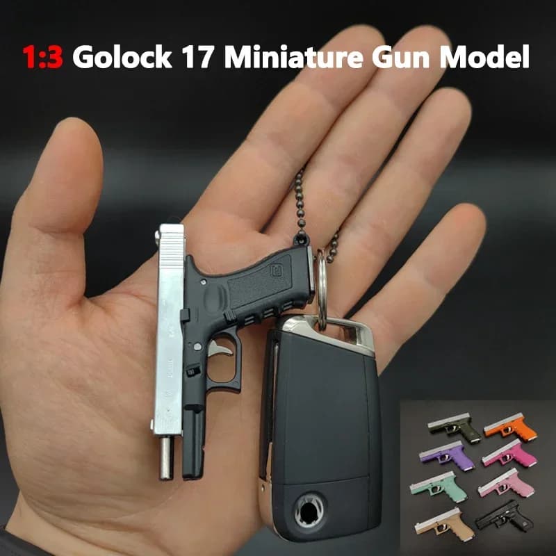 (con proiettili) Multi colori Fidget Toy Gloc k 17 Portachiavi Mini metallo G17 Pistola portatile Shell Espulsione Assemblare Smontare