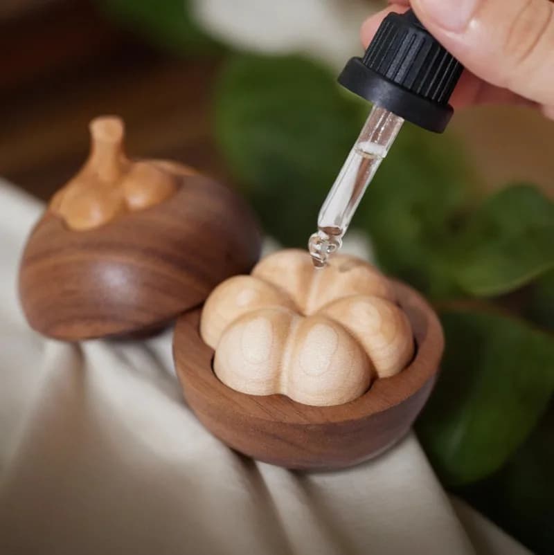 Diffusore di oli essenziali Fragranza Legno Forma di mangostano Sfera di legno Creativo montato su veicolo Noce nera Aromaterapia Profumo Legno