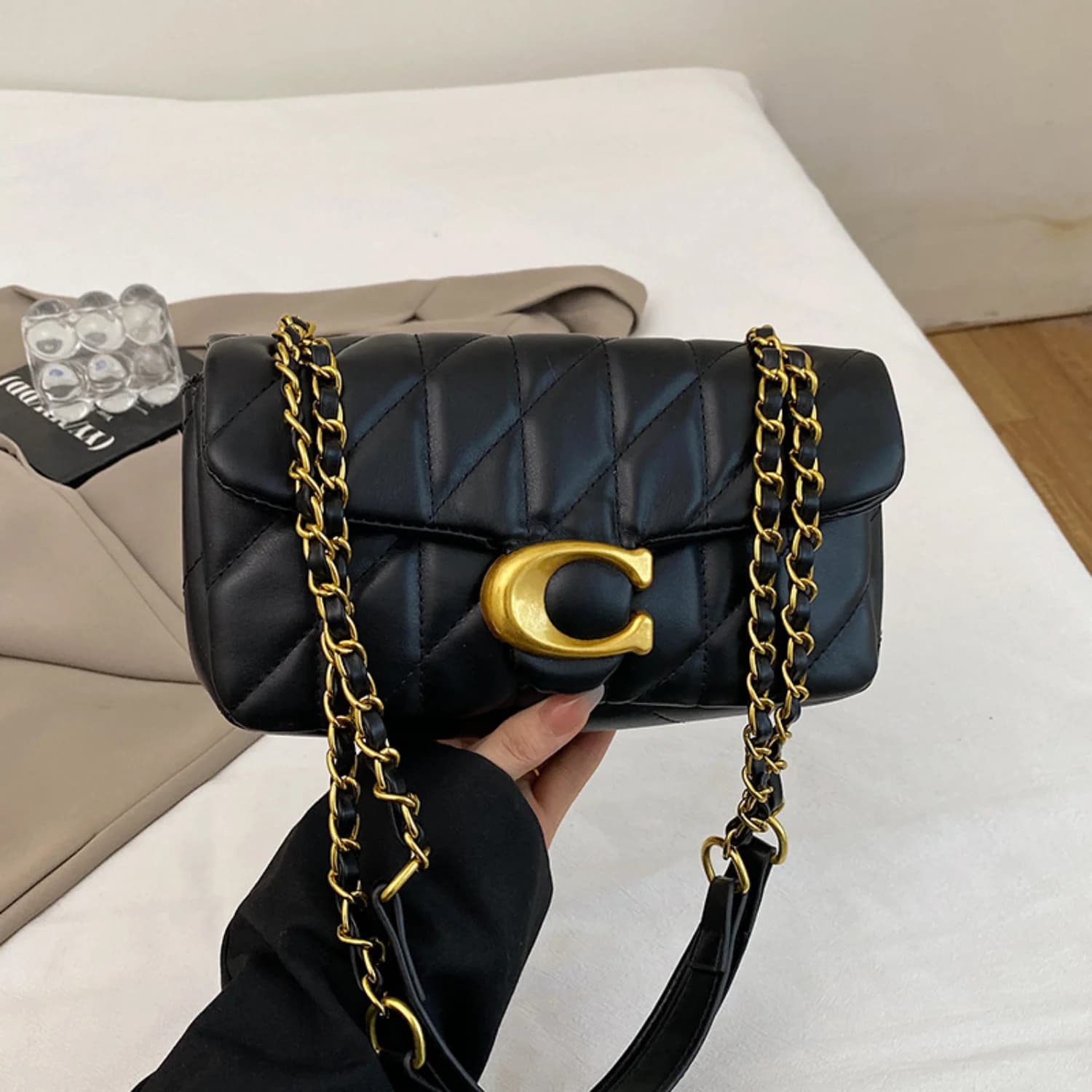 Nuova borsa a griglia con diamanti neri stile lusso leggero da donna 2026, borsa a mano da donna alla moda, zaino a spalla singola, borsa a tracolla