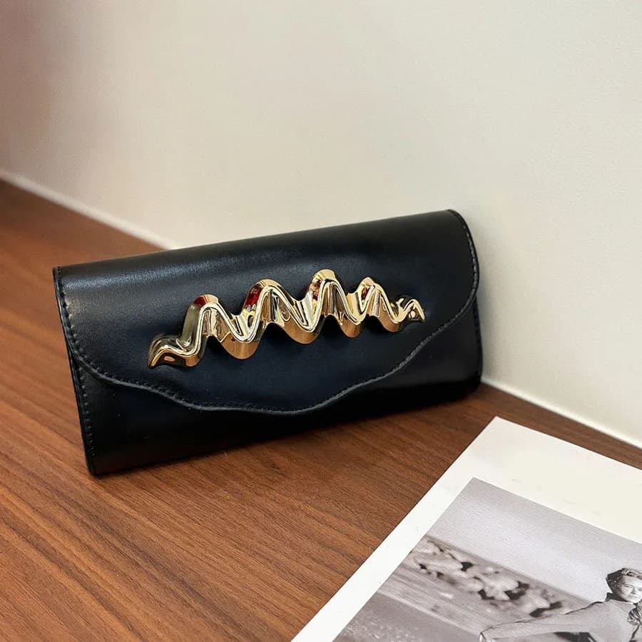 Borsa da sera alla moda, di lusso leggero, con texture in pelle, borsa a mano, stile straniero di tendenza, borsa a tracolla con catena.