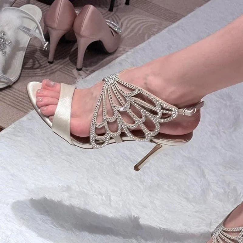 2026 New Open-Toe Rhinestone Design Slippers Hollow Out Crystal Bow Strap Sandals Fairy Style Stiletto Heels Elegant Sandals