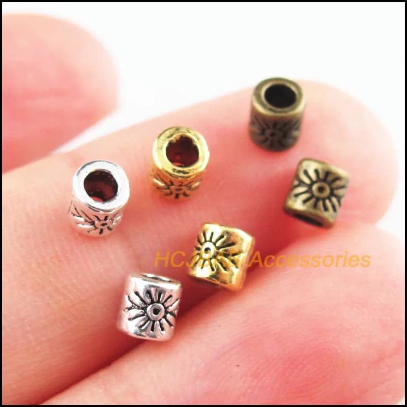 100 pezzi di perline distanziatrici per tubi di fiori placcati in bronzo dorato anticato in argento tibetano da 4 mm