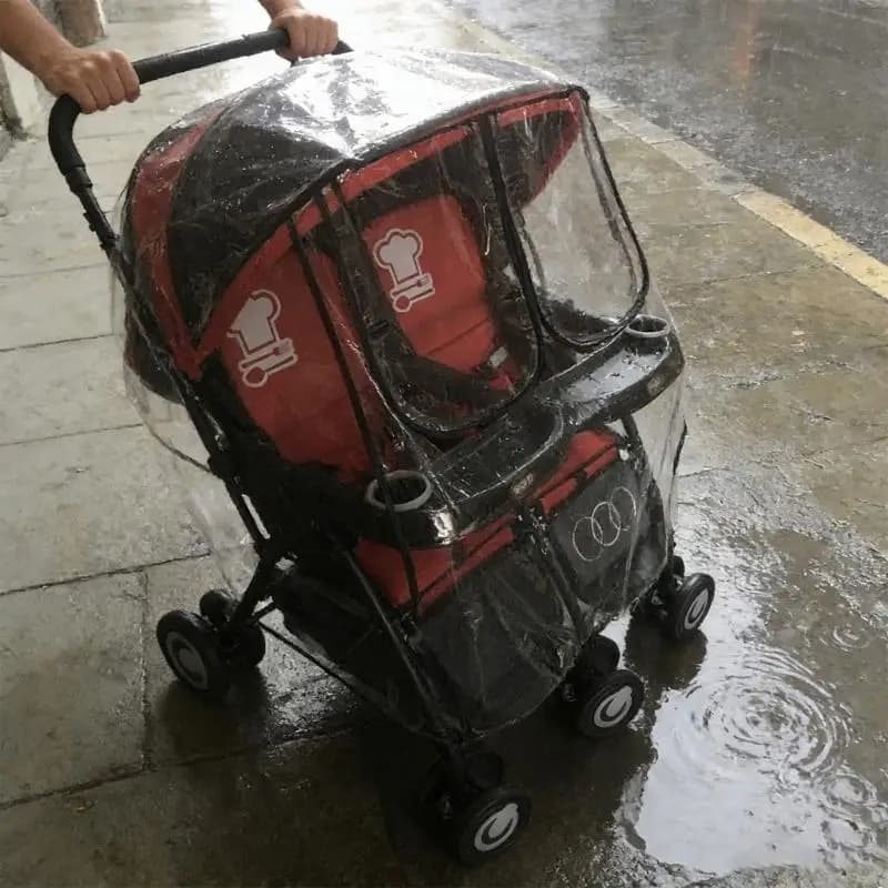 Copertura antipioggia per passeggini gemelli che fornisce copertura completa contro pioggia, vento e sabbia con struttura in