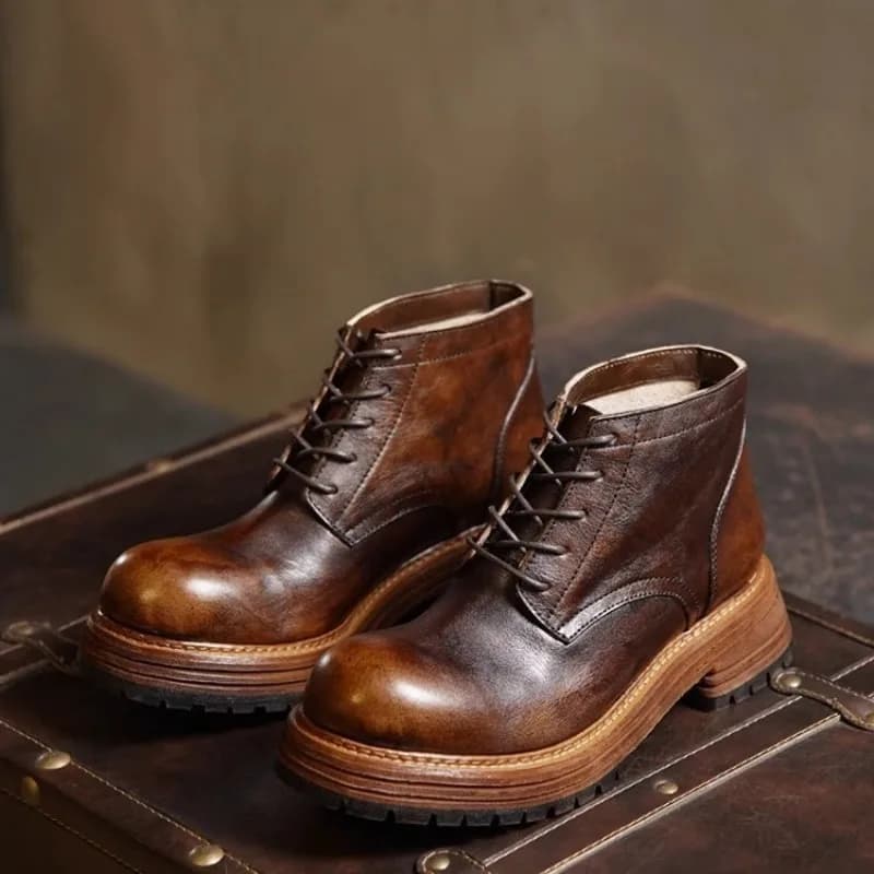 Stivaletti Chelsea alla moda da uomo punta tonda alta in vera pelle suola spessa scarpe da lavoro da passeggio per esterni stivali da moto maschili