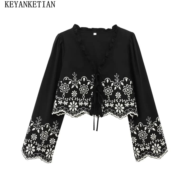 KEANKETIAN 2025 Primavera Nuova vacanza vento Scava fuori Ricamo Crop Top Agaric Fasciatura con scollo a V Manica svasata Camicia da donna Sottile