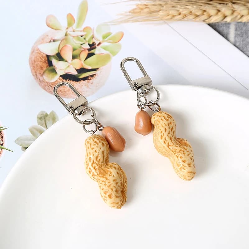 Simpatico Simulazione Cibo di Arachidi Portachiavi Portachiavi Per Le Donne Degli Uomini Regalo Creativo Divertimento Arachidi Auto Airpods Box Bag Charms Gingillo Gioielli