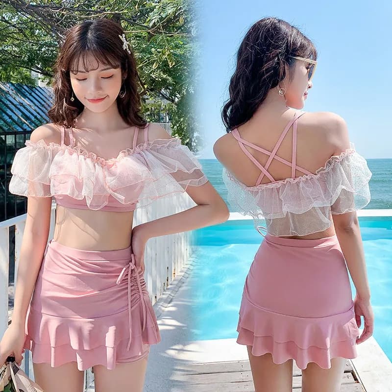 Women's bikini bikini swimsuit 2 pieces pink with mesh top and uncovered shoulders, skirt with side curls, for summer and beach