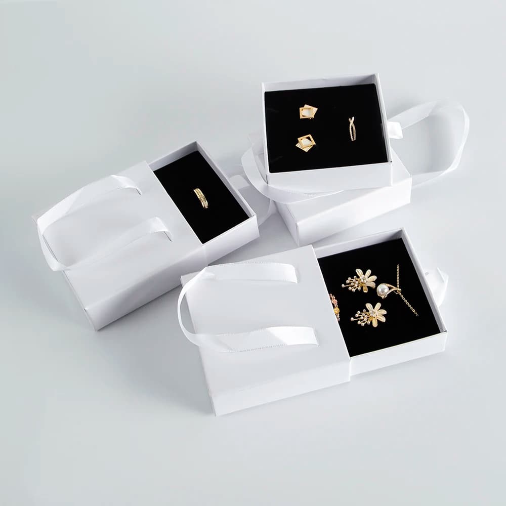 10x10x3.5cm Imballaggio di gioielli portatile Orecchino Collana Bracciale Cassetti di cartone bianco di lusso Portagioie scorrevole con manico