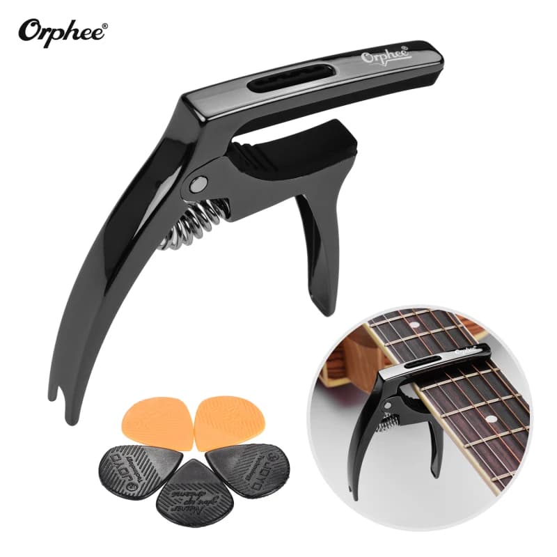 Orphee Q5 3-In-1 Capo per chitarra multifunzionale con estrattore per spille a ponte Slot per plettro per chitarra + 5 pezzi plettro per chitarra a forma di triangolo plettro
