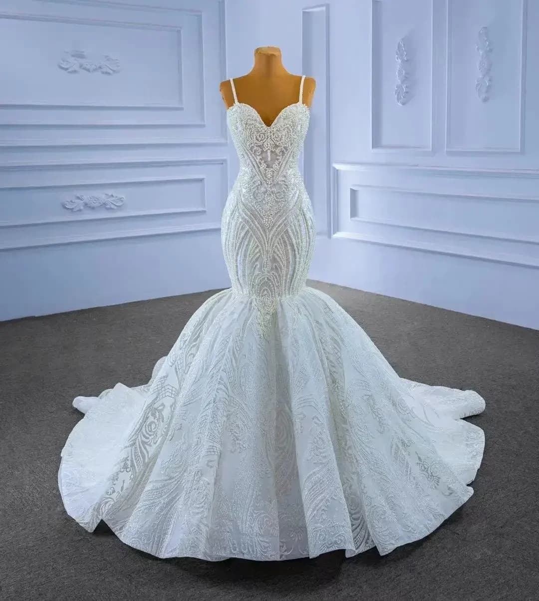 Abiti da sposa a sirena con applicazioni di pizzo di perle su misura su misura senza maniche Nuovo abito da sposa africano da sposa