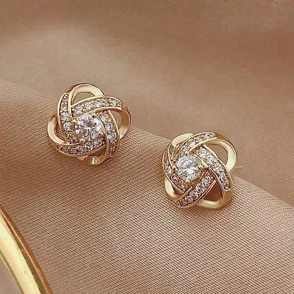 Elegant Concentric Knot Design Gold Plated Brass Earrings Sparkling Zircon Claw Paved Stud Earrings Trendy Female Fashion Jewelry Holiday Gift