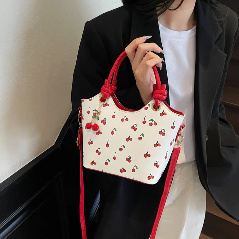 Borsa a secchiello in pelle PU con stampa ciliegie, borsa a tracolla da donna alla moda, borsa a mano piccola ed elegante con ciondolo per il pendolarismo