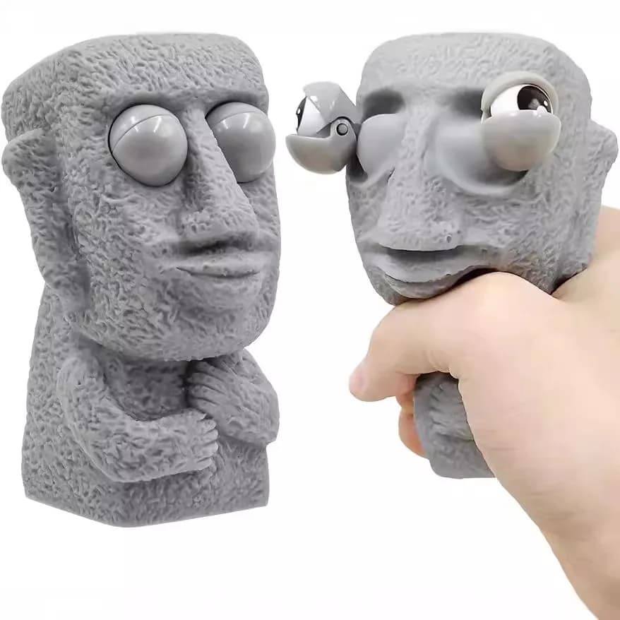 Stone man rilascia il giocattolo antistress lentamente rimbalza la statua di Moai morbida spremere gli occhi l'espressione di interesse rilassa lo stress regalo per bambini