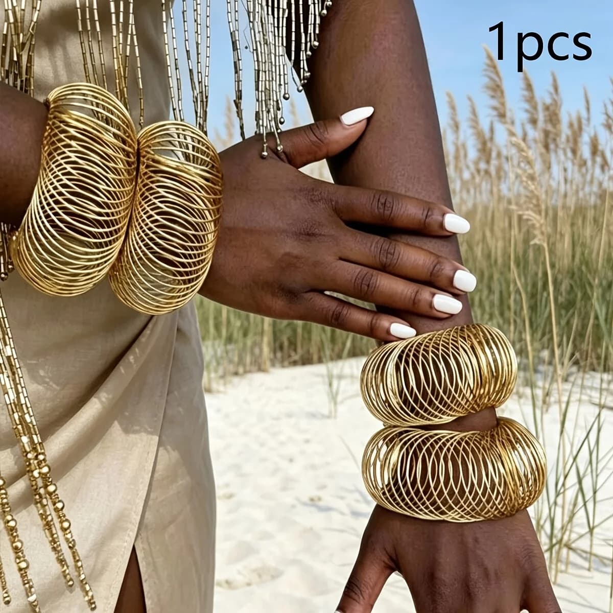 A bold, affordable luxury style multi-strand metal wire open-weave bracelet—perfect as a gift or accessory for summer beach vacations and parties.