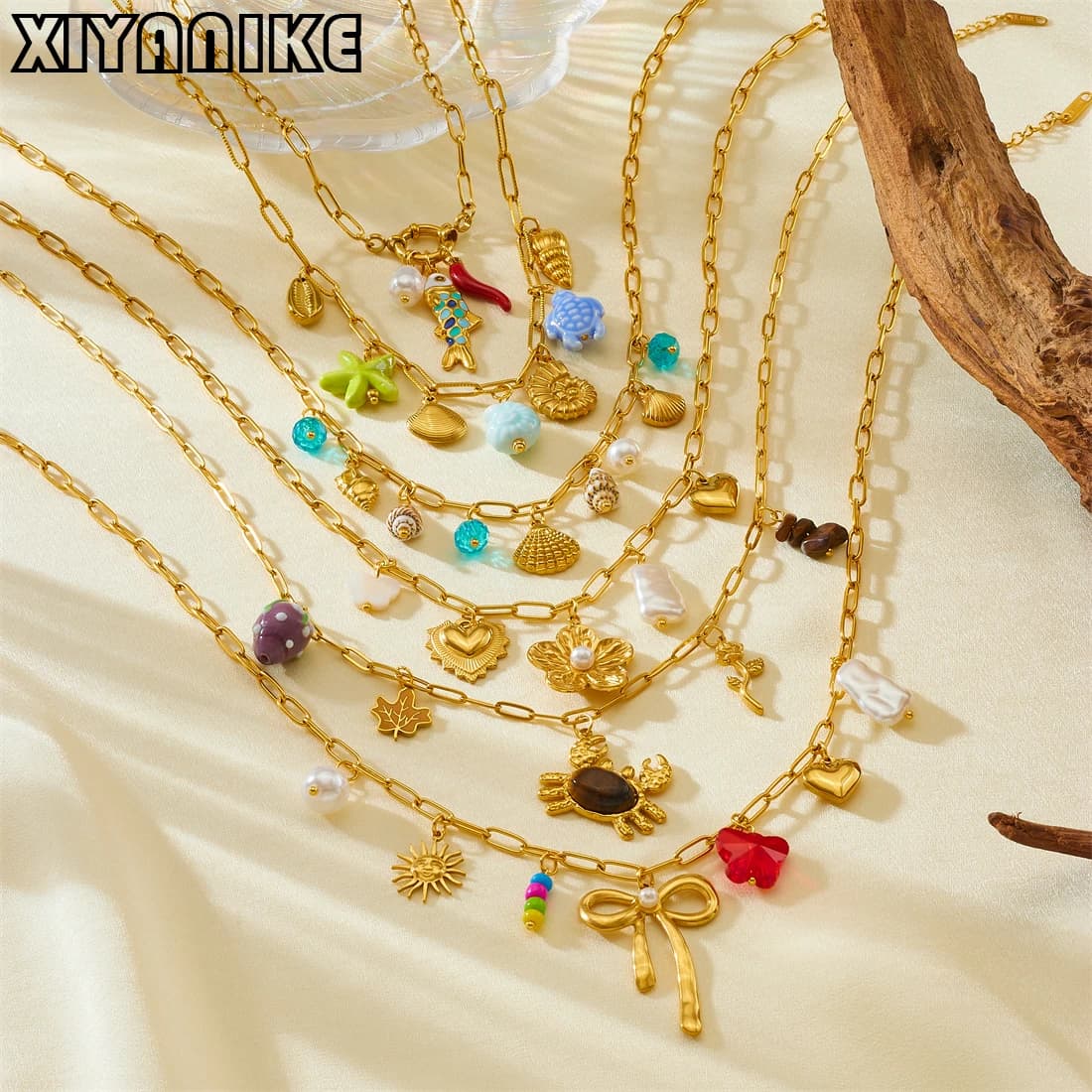 XIYANIKE 316L Acciaio Inossidabile Alla Moda Catena di Blocco Osso di Pesce Conchiglia Granchio Arco Fiore Collana di Fascino Donne Glamorous Catena al Collo