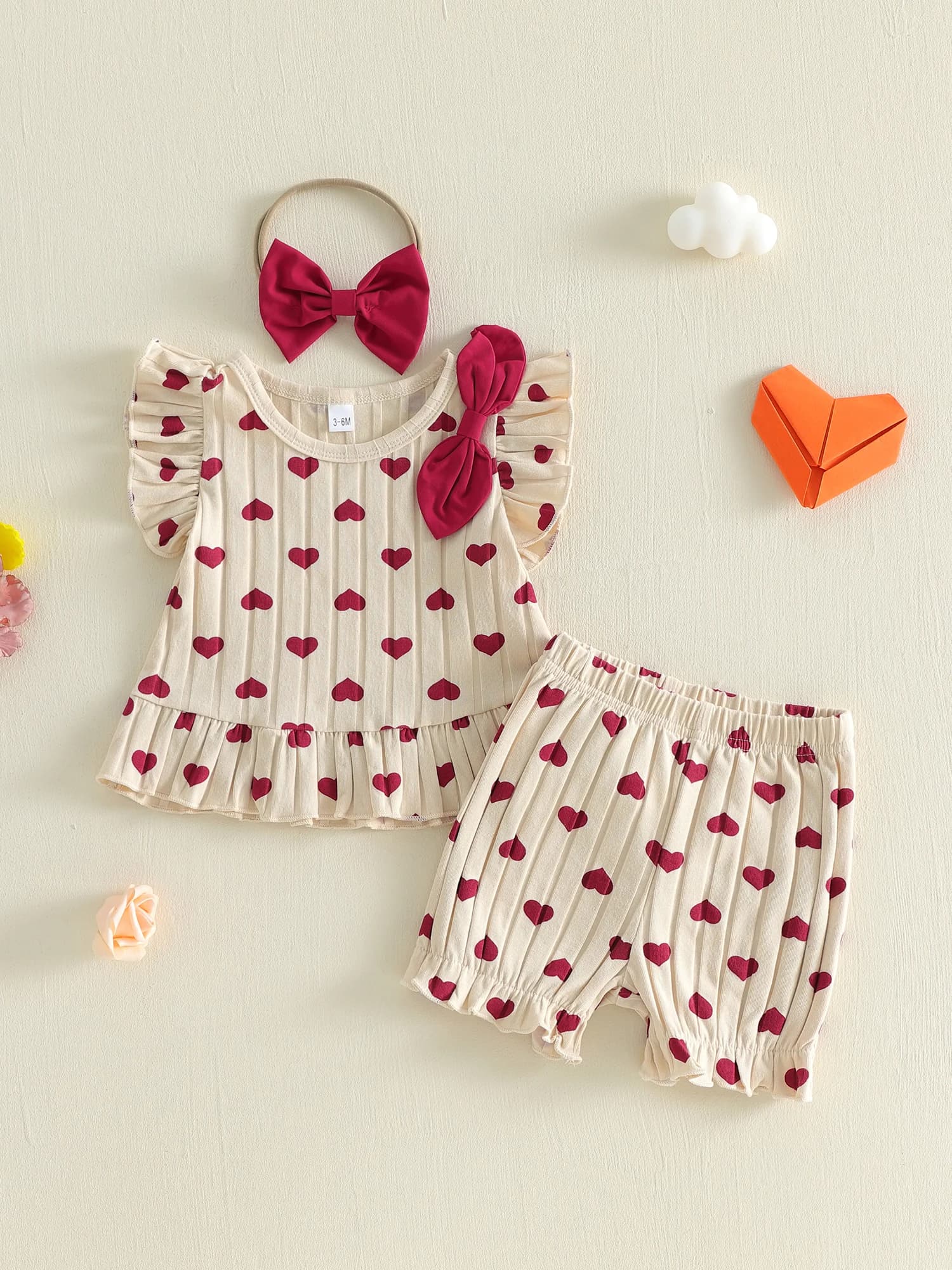 Adorabile tutina con stampa floreale per bambina con fascia per capelli abbinata e sandali con fiocco per un look estivo elegante