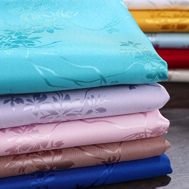 Tessuto jacquard di lusso fiore al metro per abito pigiama Kimono Cheongsam cucito fai da te liscio morbido lucido cucito panno rosso