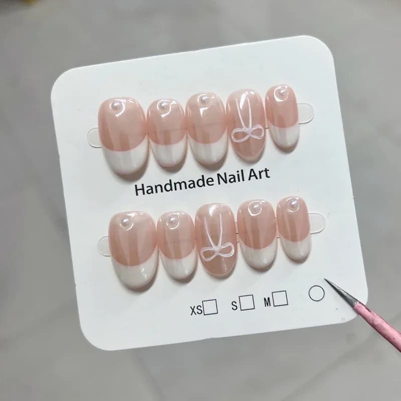 Semplice francese bianco rosa fiocco perle carino stampa sulle unghie unghie finte adesive riutilizzabili fatte a mano set di unghie finte con scatola e strumenti