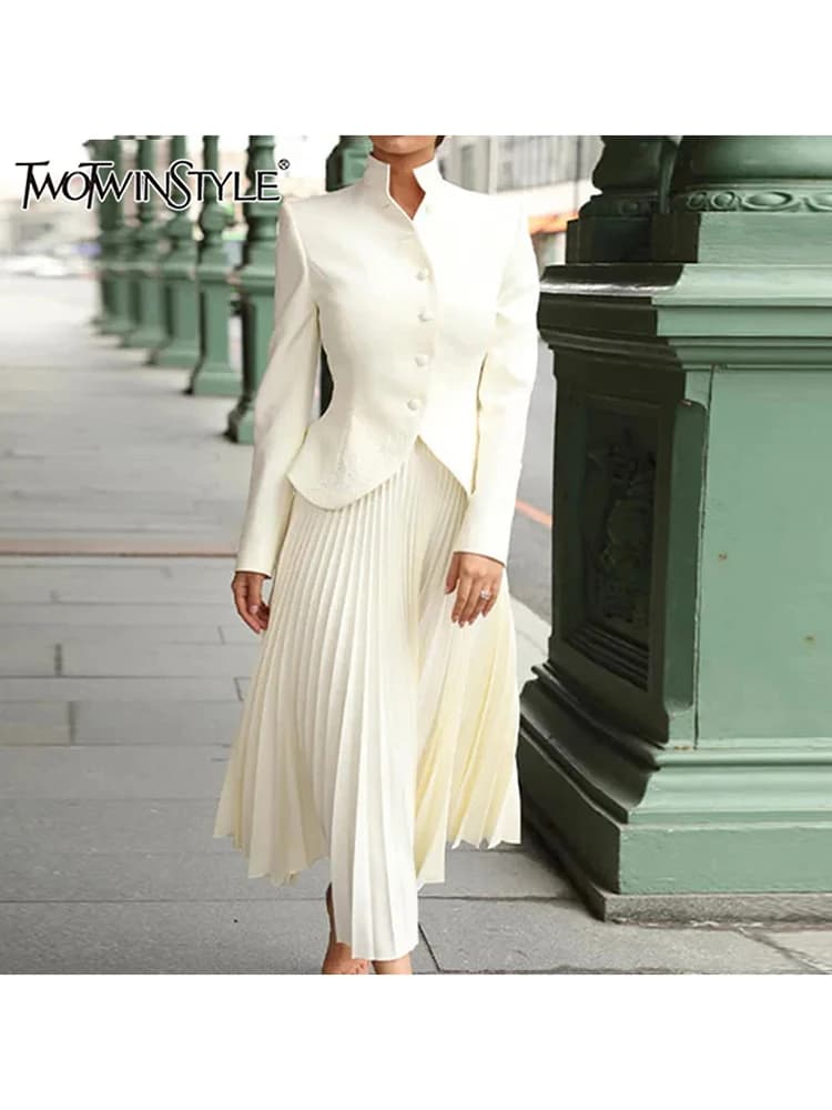 TWOTWINSTYLE Solido Set a due pezzi per le donne Colletto alla coreana Manica lunga Bottoni impiombati Top Gonna a vita alta Chic Set Moda femminile