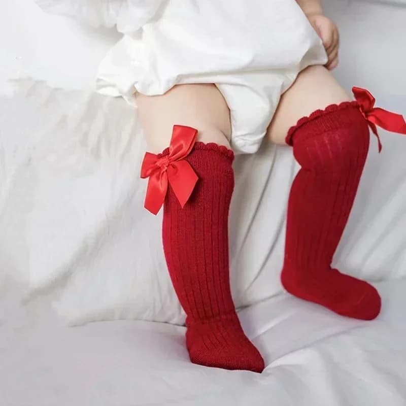Calzini alti al ginocchio con papillon rosso Calze natalizie per ragazze Neonati per bambini Calzini da pavimento antiscivolo per bambini in morbido cotone Regalo per bambini