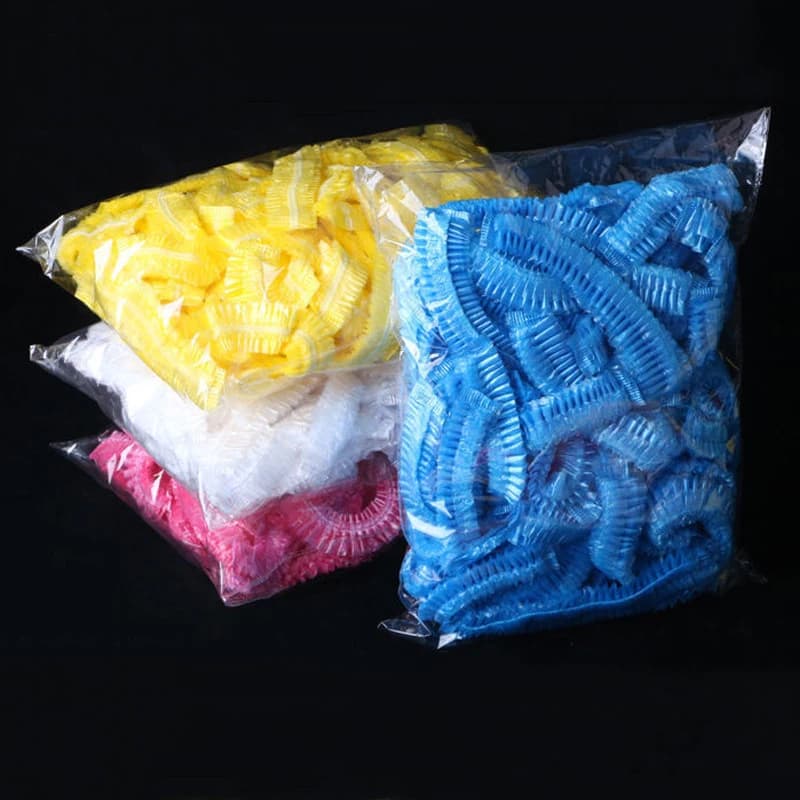 Cuffia da doccia in plastica usa e getta da 100 pezzi cuffie da doccia monouso elastiche cappello impermeabile antipolvere accessori per la bellezza del salone di capelli
