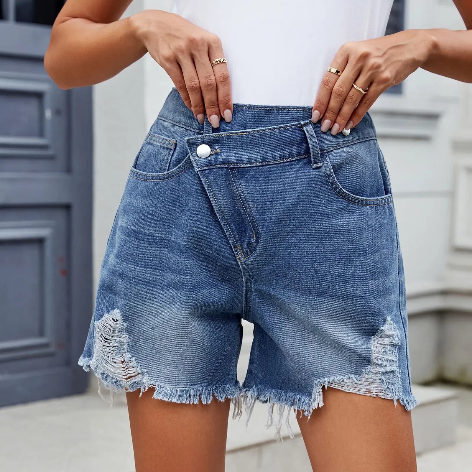Onecozyday Women High Waist Asymmetric Cross Button Ripped Frayed Hem Denim Shorts Vintage Distressed Jean Shorts With Pockets