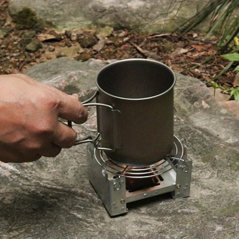 Fornello portatile da campeggio pieghevole a combustibile solido Fornello ad alcool da esterno Bruciatore ad alcool da picnic per cucinare all'aperto Zaino in spalla