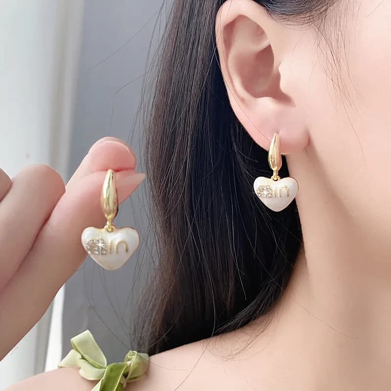 2024 new popular love earrings niche design sense light luxury high sense silver needle earrings temperament female tide