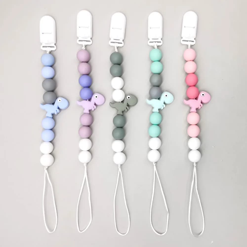 Clip per ciuccio per bambini Supporto in silicone Cartoon Dinosauro Catena per dentizione Massaggiagengive in legno per catena per ciuccio per bambini Giocattoli da masticare per allattamento Regalo