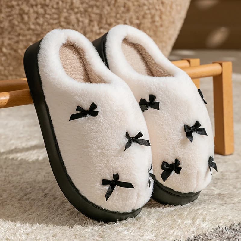 Pantofole con fiocco da donna alla moda Pantofole invernali per interni domestici Calde antiscivolo EVA con fondo spesso Scarpe per coppie Scivoli da casa con suola morbida in peluche
