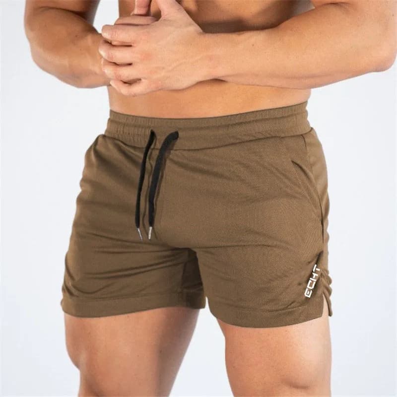 2024 New Fitness Big Muscle Man Fitness Pantaloncini slim da corsa e allenamento sulla spiaggia con corda da tirare e pantaloncini fitness a tre punti