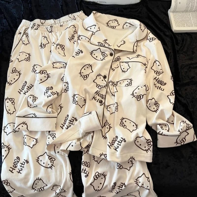 Pigiama di velluto tedesco stampato alla moda carino Hello Kitty per ragazze Set di pantaloni casual caldi autunnali e invernali stile caldo per la casa