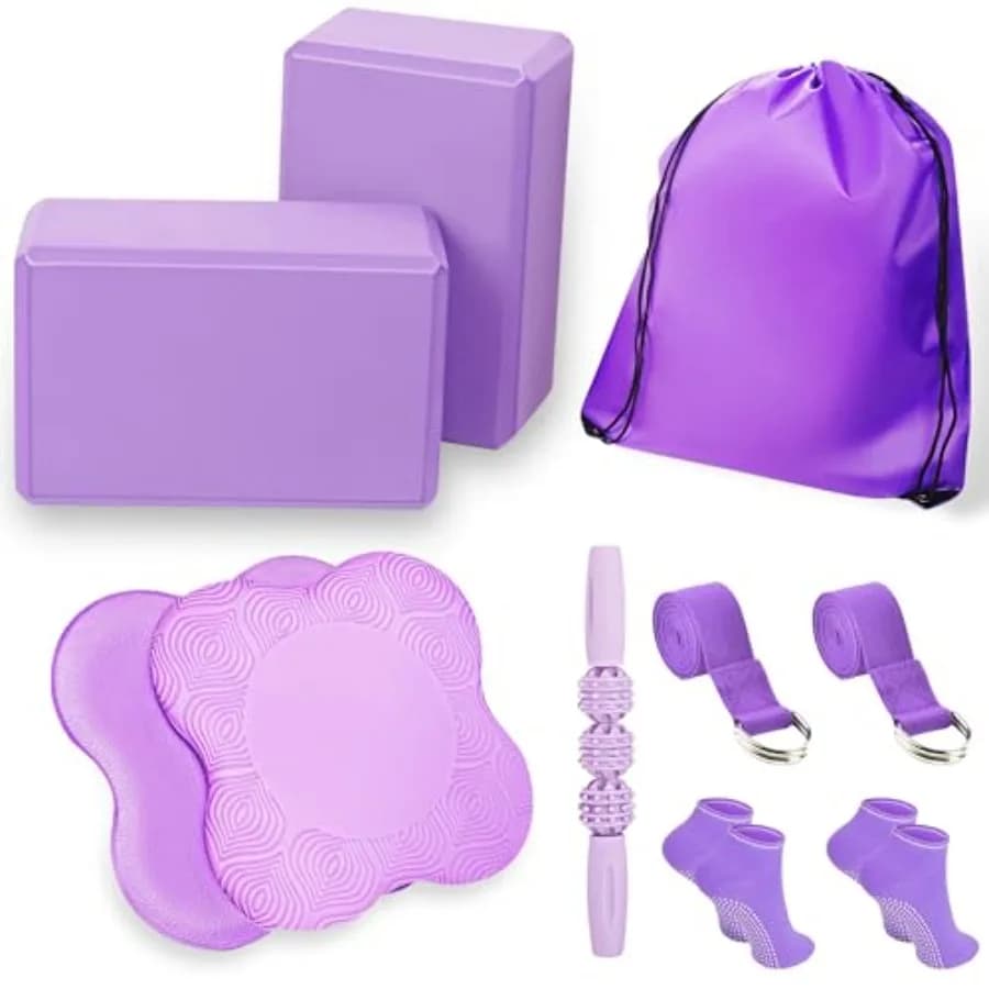 2 blocchi per yoga, accessori di supporto tra cui 2 ginocchiere, 2 con cinturino per mettere meno peso sulle polsi, 1 rullo per massaggio muscolare