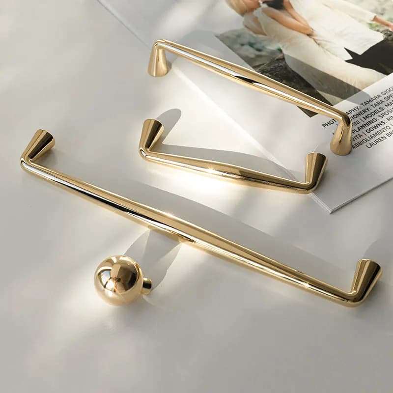 Maniglie per armadietti moderni in oro lucido manopola a sfera per cassetti in oro spazzolato in lega di zinco grigio lungo armadio tira Hardware per mobili semplice